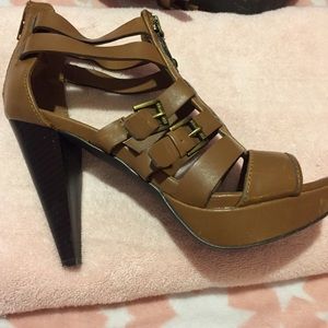 Brown heels by Guess